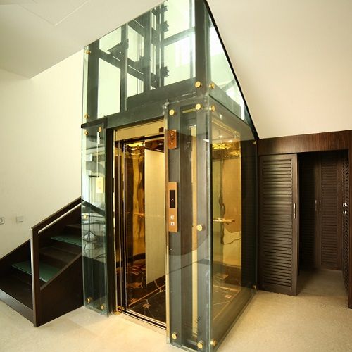 Tấm ốp inox gương vàng trang trí thang máy