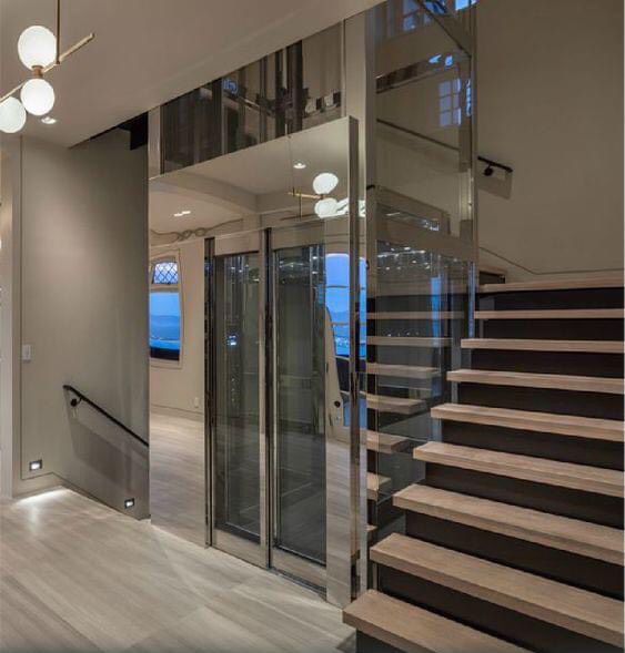 Tấm inox gương xám trang trí thang máy